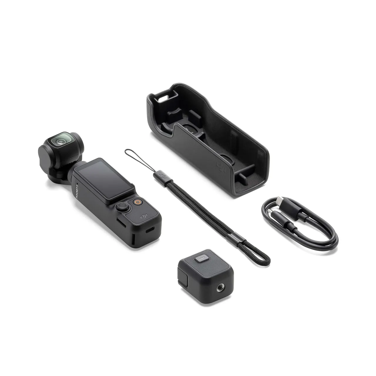 The full kit laid out: camera, protective case, wrist strap, mount adapter and USB-C cable