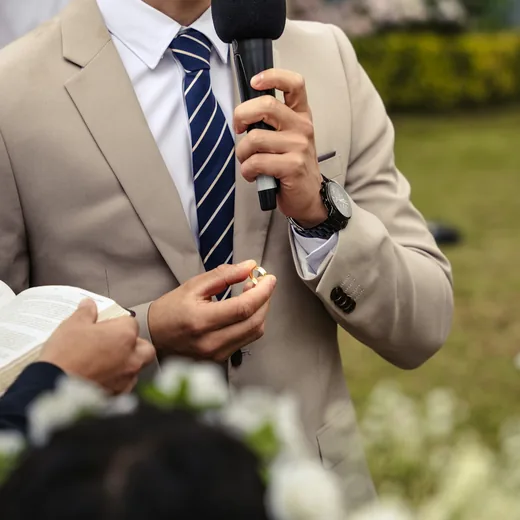 A speech read from notes into a microphone